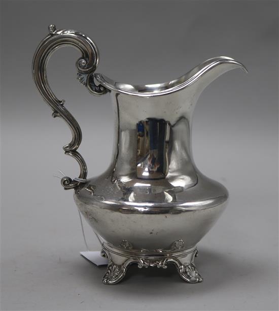 A William IV silver cream jug, with scroll handle, on scroll feet, The Barnards, London, 1835, 9 oz.